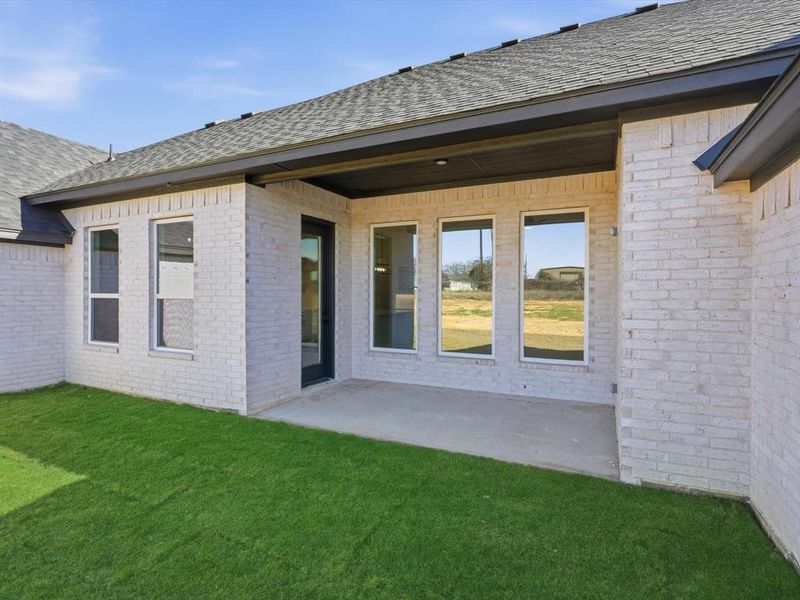 Exterior details and patio area of a home in , Azle (Image 3).