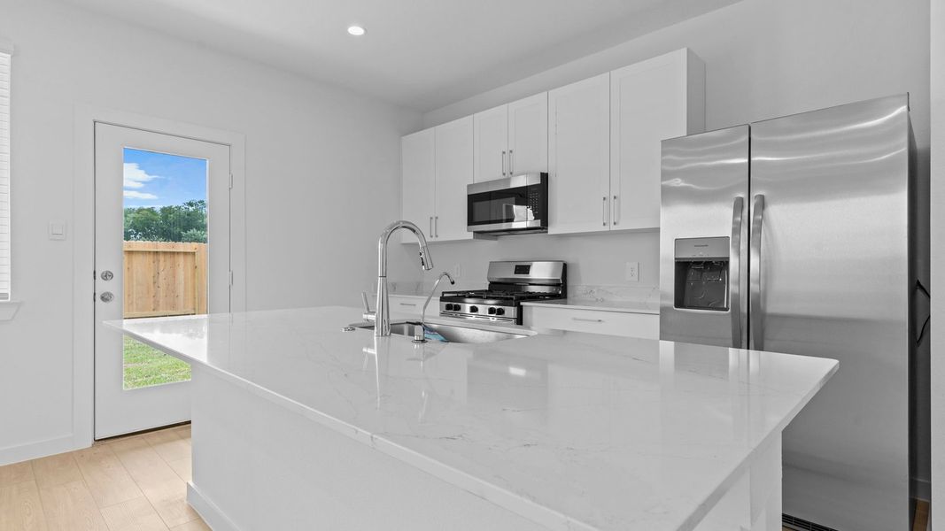 Furnished interior view inside a new home in Lexington Village, Missouri City (Image 10).