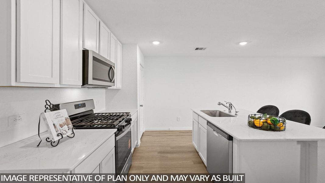Furnished interior view inside a new home in Sunterra, Katy (Image 8).