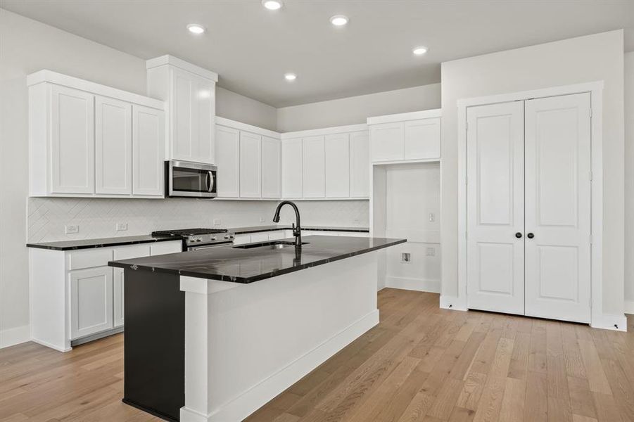 Furnished interior view inside a new home in North Square at Uptown, Celina (Image 11).