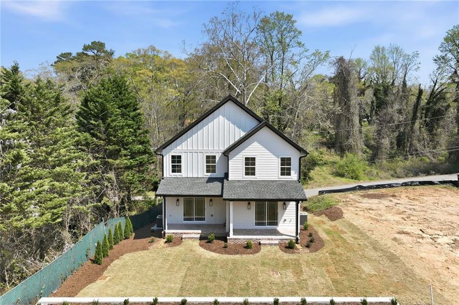 Front exterior of a new home in , Gainesville, GA, highlighting curb appeal (Image 16).