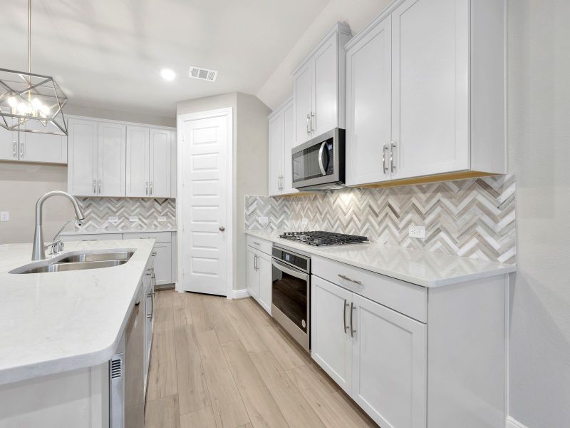 Furnished interior view inside a new home in Pine Lake Cove - Classic Series, Montgomery (Image 9).