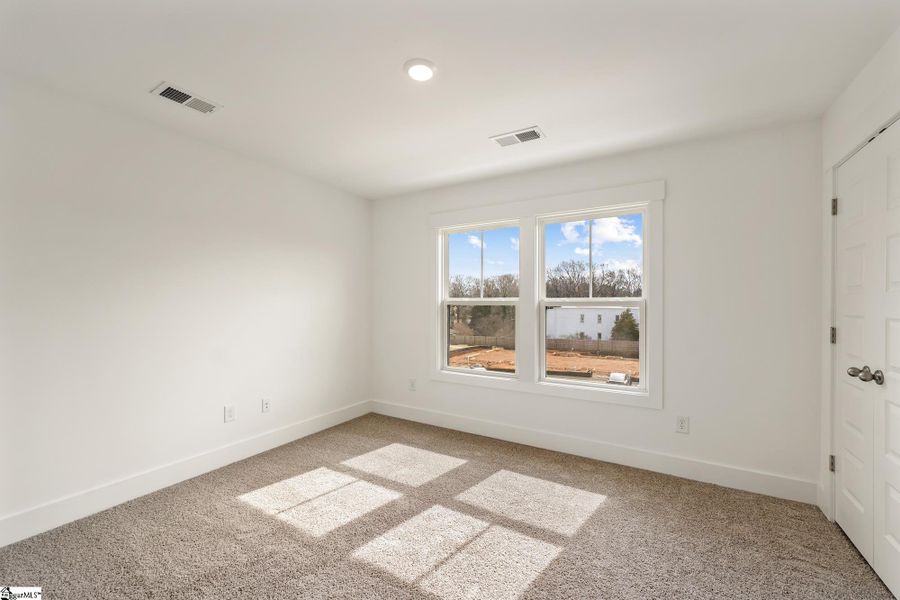 Spacious, unfurnished interior of a new home in Renaissance Place, Greenville (Image 19).