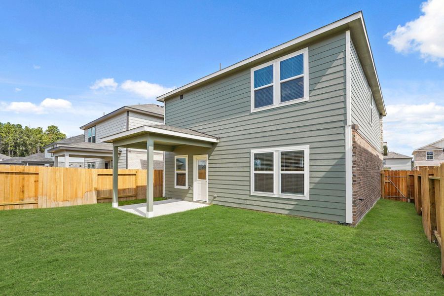 Exterior details and patio area of a home in Lakes at Black Oak, Magnolia (Image 2). Exterior details and patio area of a home in Lakes at Black Oak, Magnolia (Image 2).