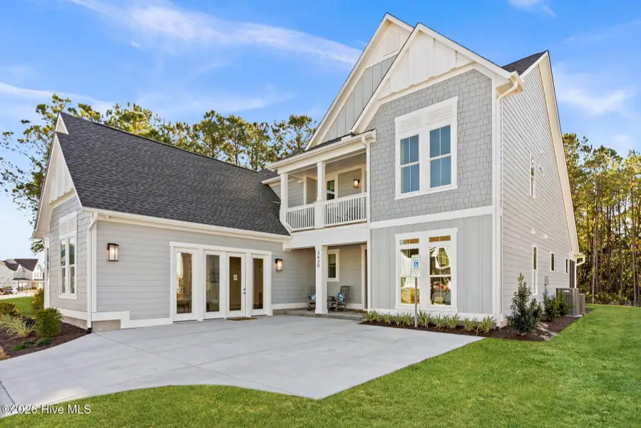 Front exterior of a new home in East & Mason, Wilmington, NC, highlighting curb appeal (Image 2). Front exterior of a new home in East & Mason, Wilmington, NC, highlighting curb appeal (Image 2).