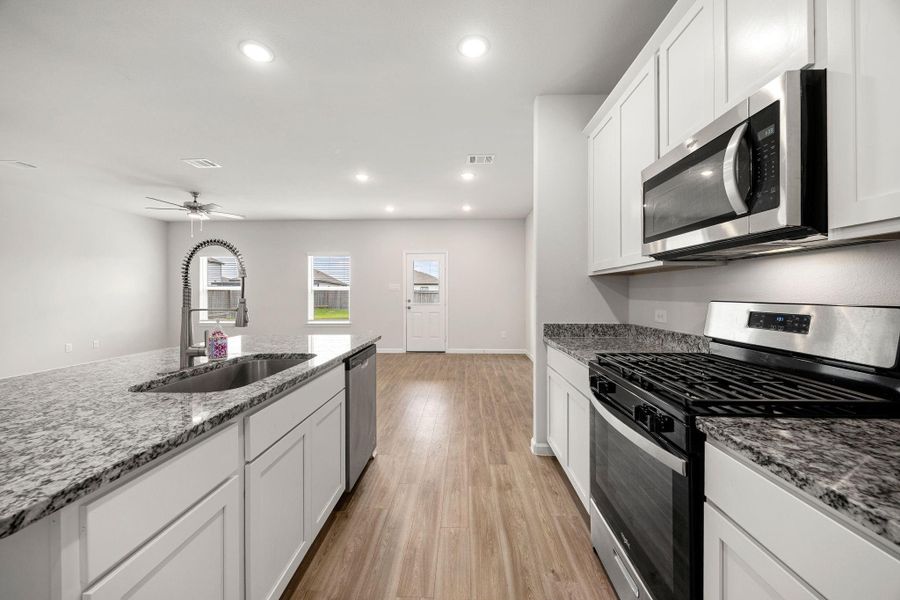 Furnished interior view inside a new home in Granger Pines, Conroe (Image 6).