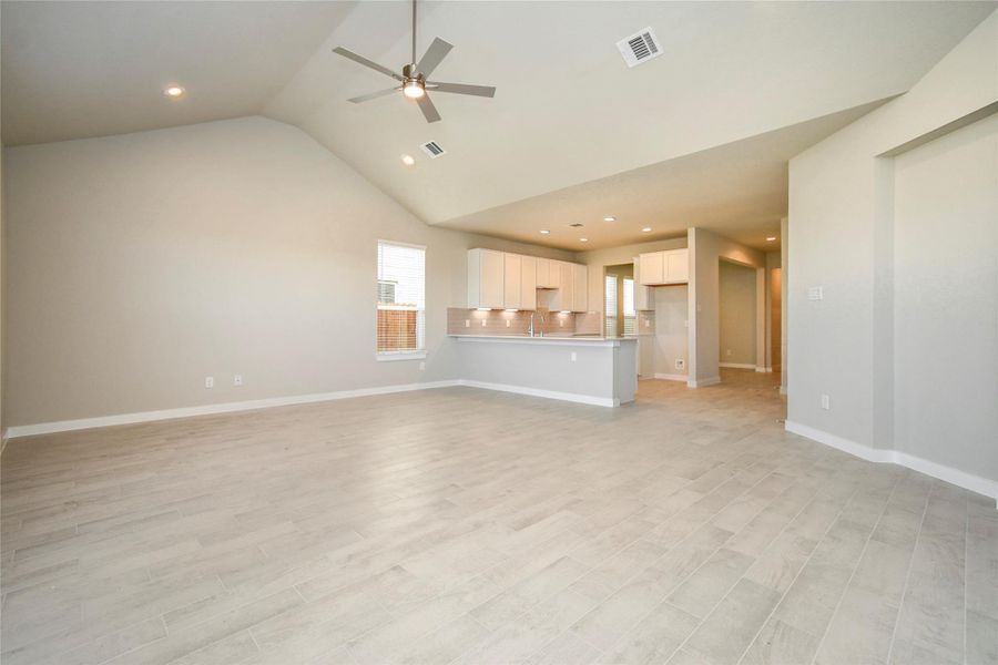 Bring your loved ones and guests together in the inviting living room! Sample photo of completed home with similar floor plan. Actual colors and selections may vary. Bring your loved ones and guests together in the inviting living room! Sample photo of completed home with similar floor plan. Actual colors and selections may vary.