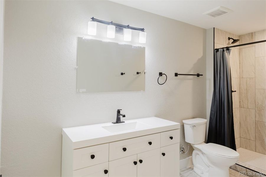 This newly finished 3/4 bath is located on the basement level. This newly finished 3/4 bath is located on the basement level.