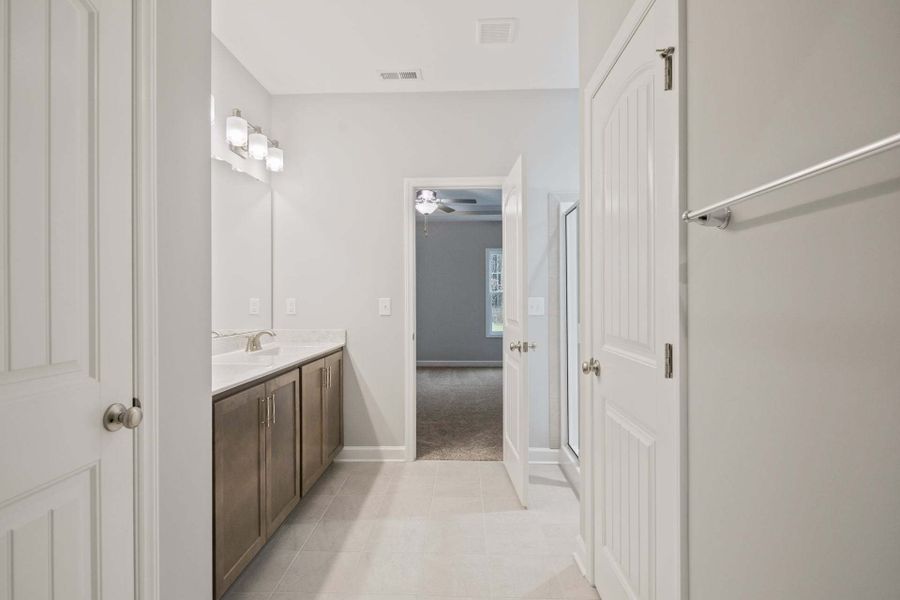 Representative unfurnished interior of a home built from the Garland by Caviness & Cates Communities in Bartlett Manor, Youngsville (Image 220). Representative unfurnished interior of a home built from the Garland by Caviness & Cates Communities in Bartlett Manor, Youngsville (Image 220).