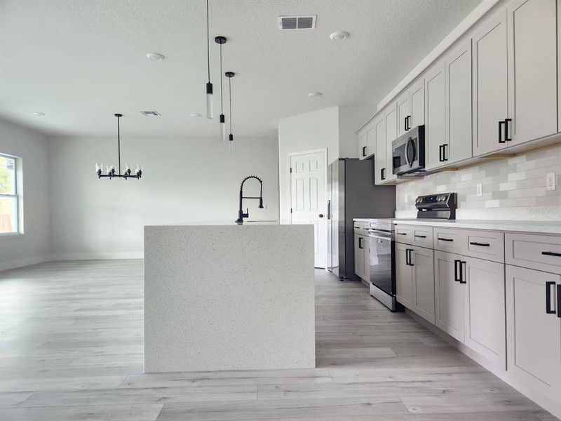 Furnished interior view inside a new home in , Palm Bay (Image 14). Furnished interior view inside a new home in , Palm Bay (Image 14).