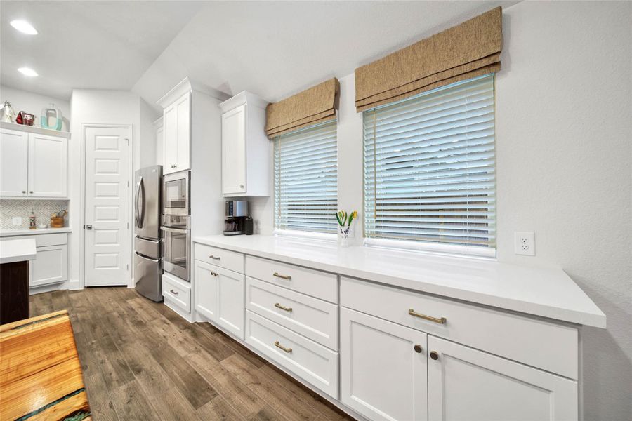 This convenient serving/prep counter adds valuable workspace & additional storage—an ideal complement to the kitchen island.