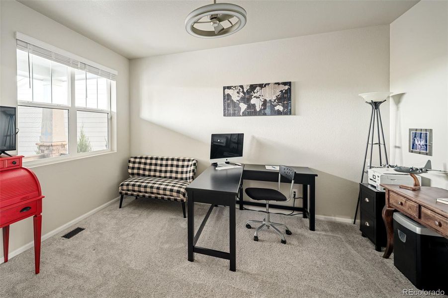 Furnished interior view inside a new home in Murphy Creek, Aurora (Image 22).