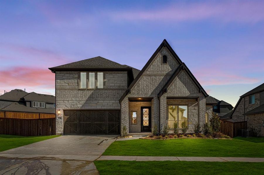 Front exterior of a new home in Windsong Ranch, Prosper, TX, highlighting curb appeal (Image 26).