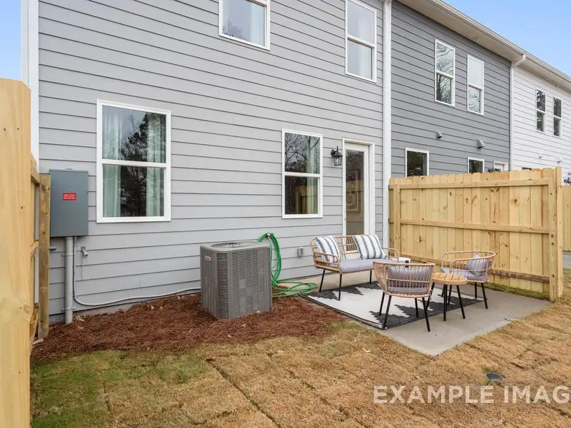 Exterior details and patio area of a home in Townes at North Main, Lillington (Image 4).