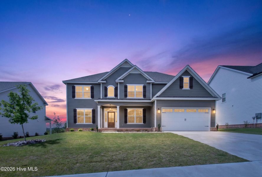 Front exterior of a new home in Highland Lakes, Evans, GA, highlighting curb appeal (Image 26).
