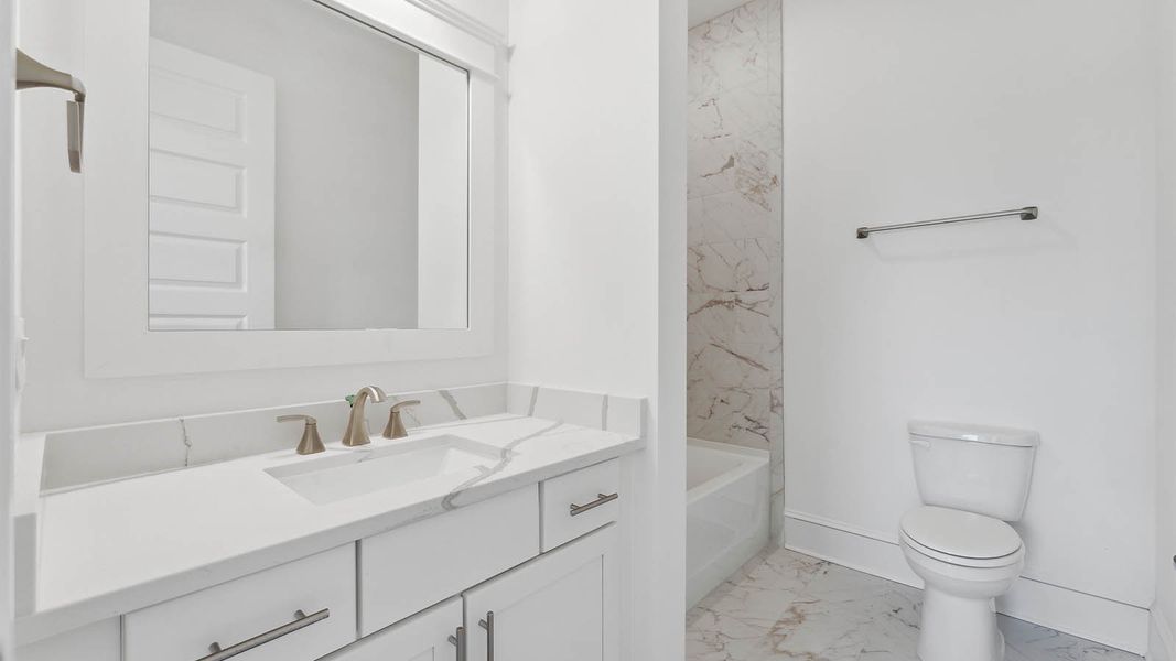 Representative furnished interior of a home built from the Cayman by D.R. Horton in Parkside, Santa Rosa Beach (Image 12).