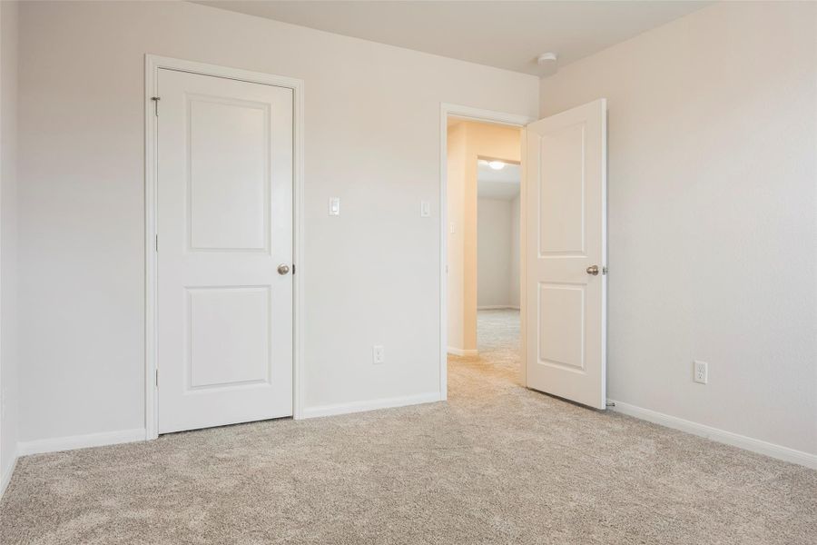 Spacious, unfurnished interior of a new home in Sunterra, Katy (Image 19).