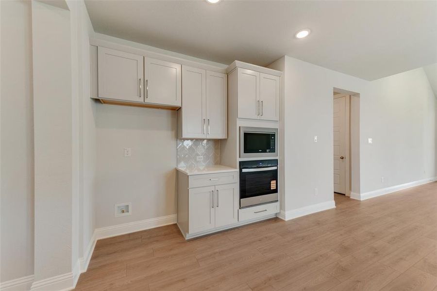 Furnished interior view inside a new home in Villages of Creekwood, Frisco (Image 9).