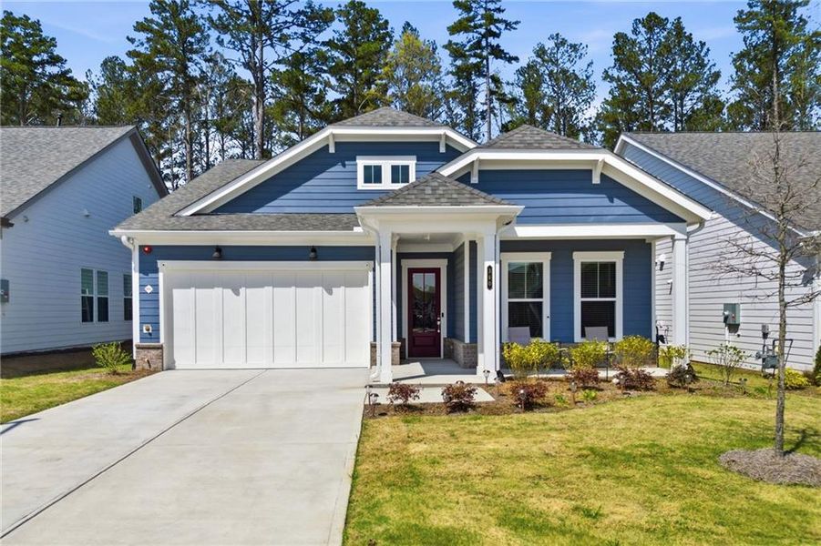 Front exterior of a new home in The Reserve at Bells Ferry, Kennesaw, GA, highlighting curb appeal (Image 1). Front exterior of a new home in The Reserve at Bells Ferry, Kennesaw, GA, highlighting curb appeal (Image 1).