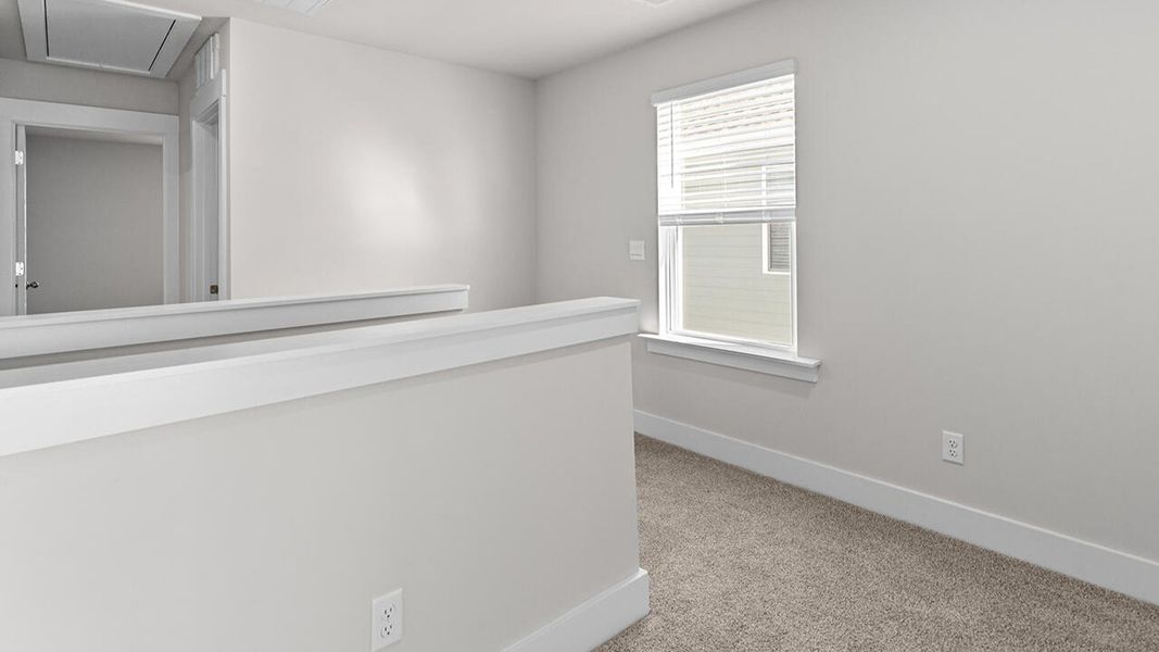 Spacious, unfurnished interior of a new home in The Haven at Indigo Preserve, Leland (Image 22).