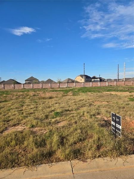 Front exterior of a new home in Sunterra, Katy, TX, highlighting curb appeal (Image 29). Front exterior of a new home in Sunterra, Katy, TX, highlighting curb appeal (Image 29).