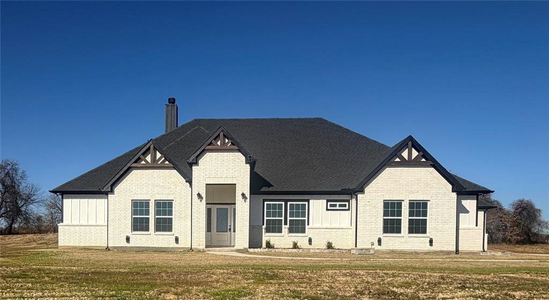 Exterior details and patio area of a home in , Poolville (Image 3).