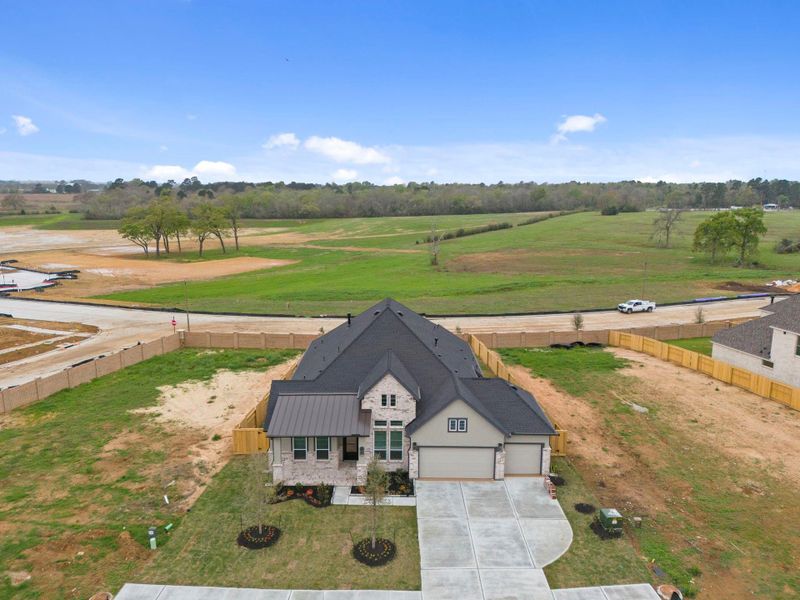 Front exterior of a new home in Briarley, Montgomery, TX, highlighting curb appeal (Image 23).
