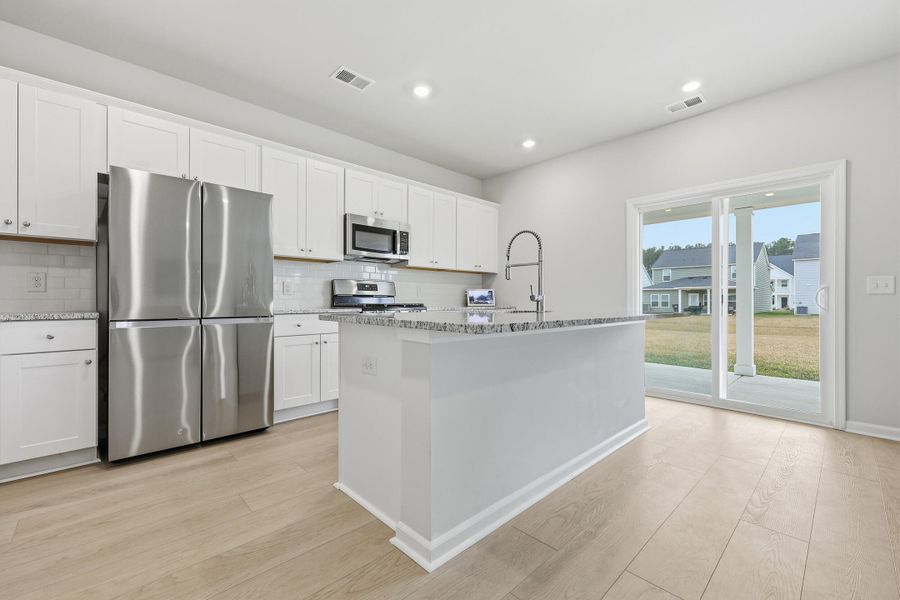 Furnished interior view inside a new home in Sweetgrass at Summers Corner: Carolina Collection, Summerville (Image 18).