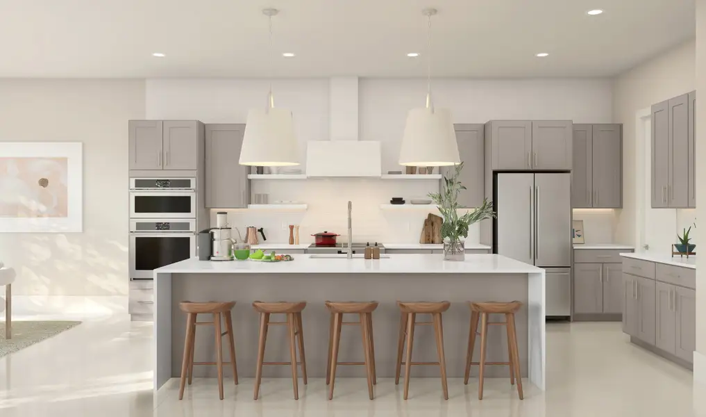 Kitchen featuring vast island & pendant lights