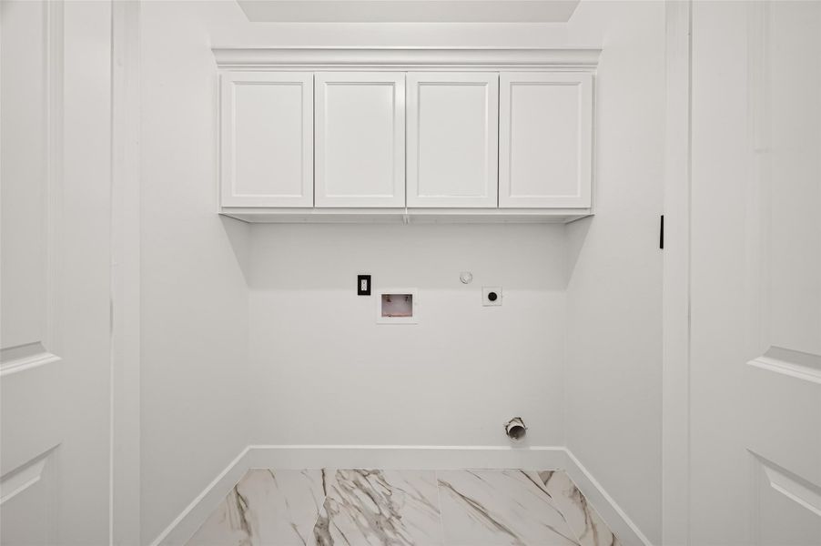 Laundry room with custom cabinetry