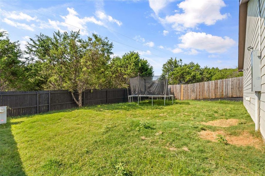 Front exterior of a new home in , Granbury, TX, highlighting curb appeal (Image 28). Front exterior of a new home in , Granbury, TX, highlighting curb appeal (Image 28).