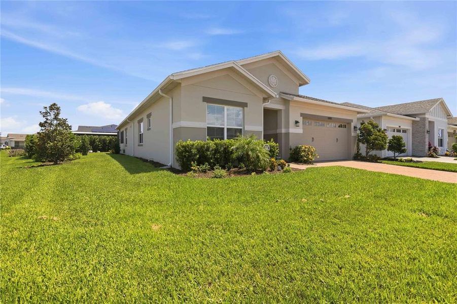 Front exterior of a new home in , St. Cloud, FL, highlighting curb appeal (Image 20). Front exterior of a new home in , St. Cloud, FL, highlighting curb appeal (Image 20).