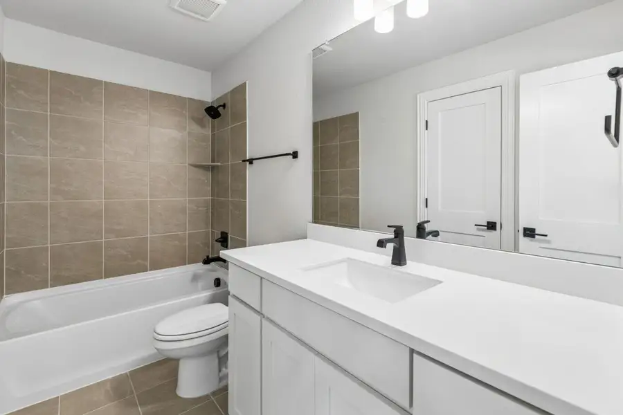 Furnished interior view inside a new home in Heath Golf & Yacht Club, Heath (Image 11).