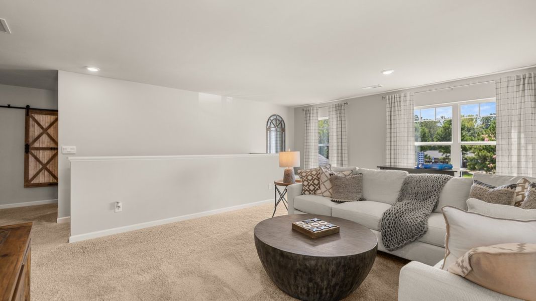 Representative furnished interior of a home built from the Elle by D.R. Horton in Twin Lakes, Hoschton (Image 29).