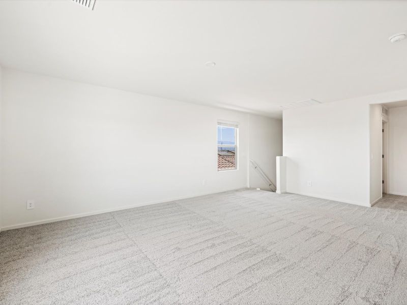 Spacious, unfurnished interior of a new home in Mandarina - Signature Series, Marana (Image 10).