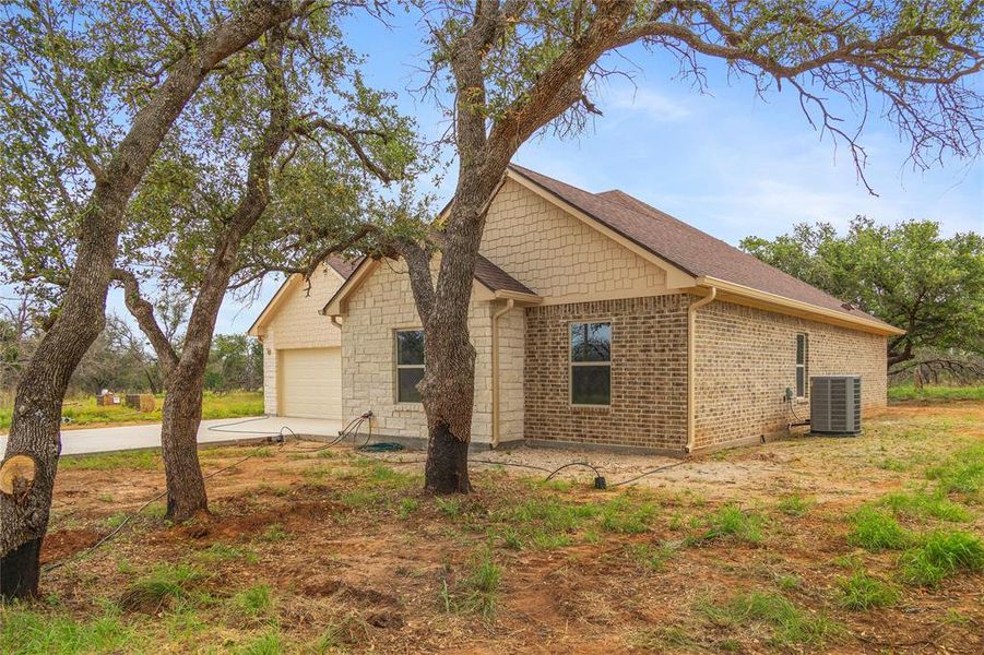 Exterior details and patio area of a home in , Brownwood (Image 21).