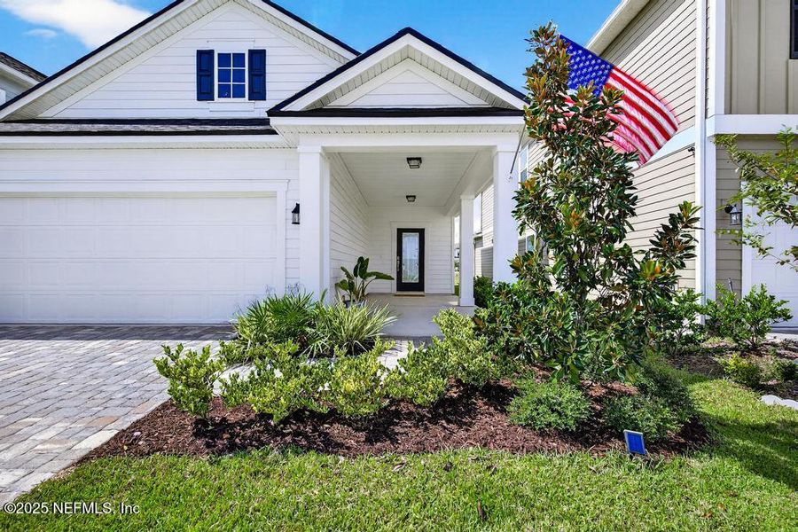 Exterior details and patio area of a home in Silver Landing at SilverLeaf, St. Augustine (Image 31).