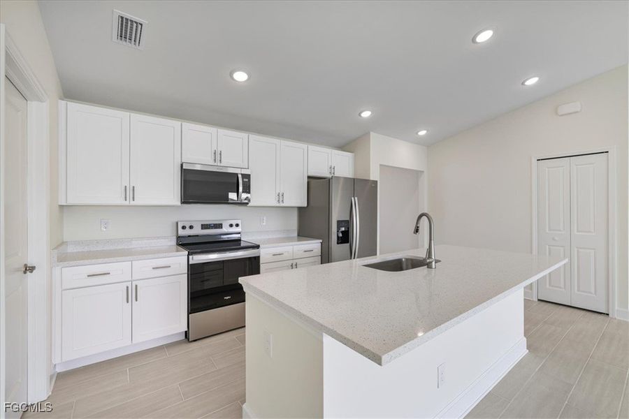 Furnished interior view inside a new home in Cape Coral, Cape Coral (Image 9). Furnished interior view inside a new home in Cape Coral, Cape Coral (Image 9).