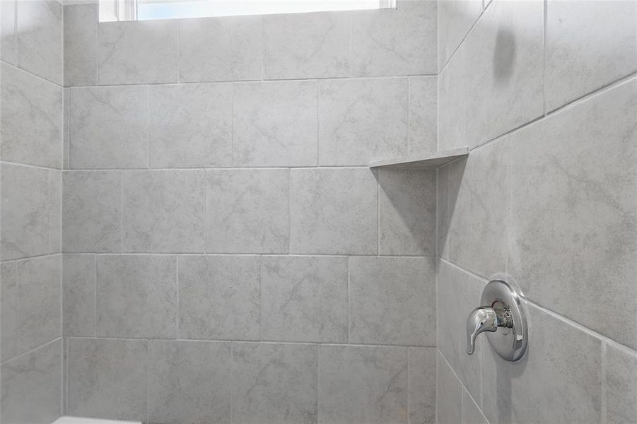 Bathroom view of tiled shower Bathroom view of tiled shower