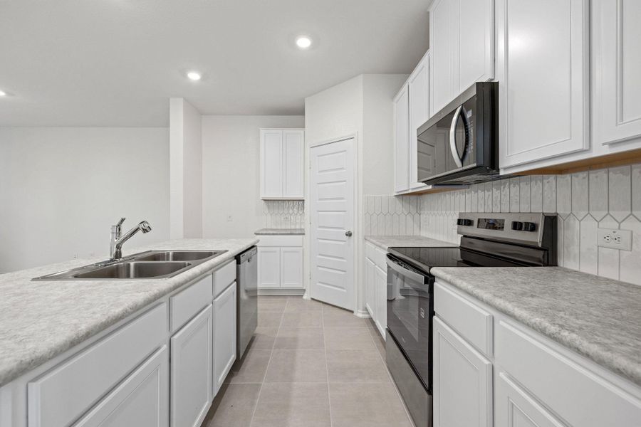 Furnished interior view inside a new home in Sonterra - Cool Water, Jarrell (Image 12).