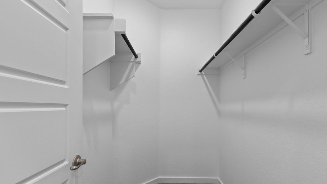 Representative unfurnished interior of a home built from the CARLSBAD by D.R. Horton in Northwest Passage, Midland (Image 12). Representative unfurnished interior of a home built from the CARLSBAD by D.R. Horton in Northwest Passage, Midland (Image 12).