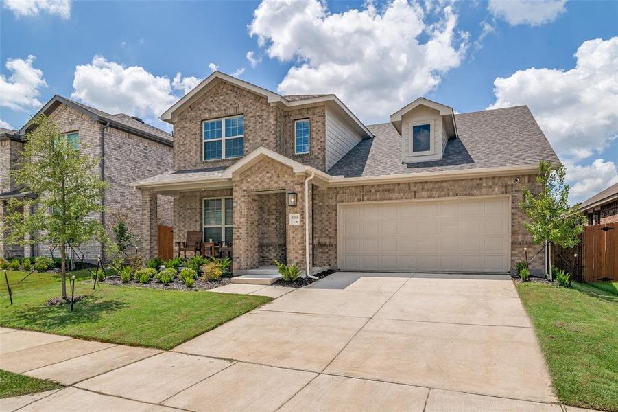 Front exterior of a new home in Heartland, Heartland, TX, highlighting curb appeal (Image 1). Front exterior of a new home in Heartland, Heartland, TX, highlighting curb appeal (Image 1).