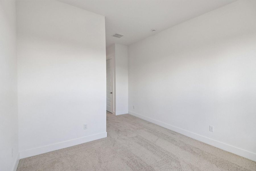 Spacious, unfurnished interior of a new home in The Grand Prairie 60', Hockley (Image 28).