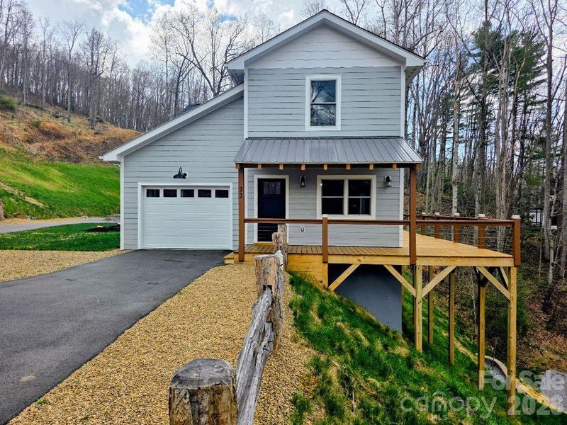22 Saltbox Haven front view with garage and deck showing