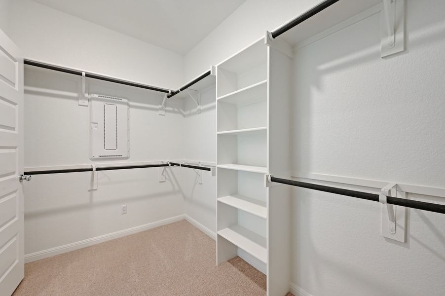 Primary Closet in the Cedar home plan by Trophy Signature Homes – REPRESENTATIVE PHOTO