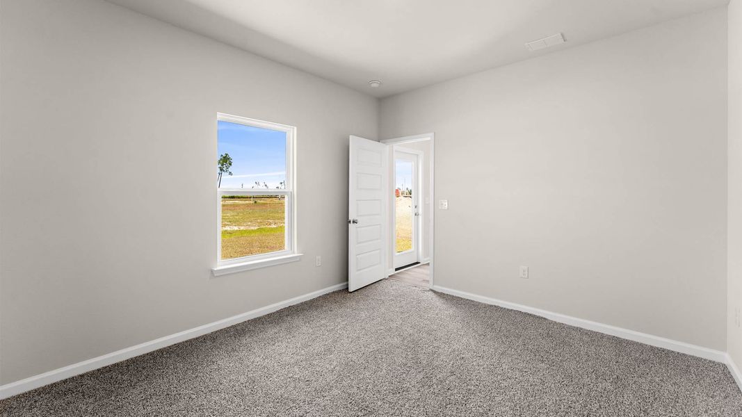 Representative unfurnished interior of a home built from the The Poppy by D.R. Horton in Liberty, Panama City (Image 27).