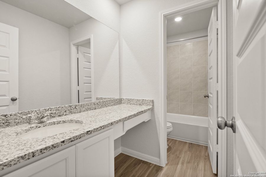 Furnished interior view inside a new home in Cinco Lakes, San Antonio (Image 8).