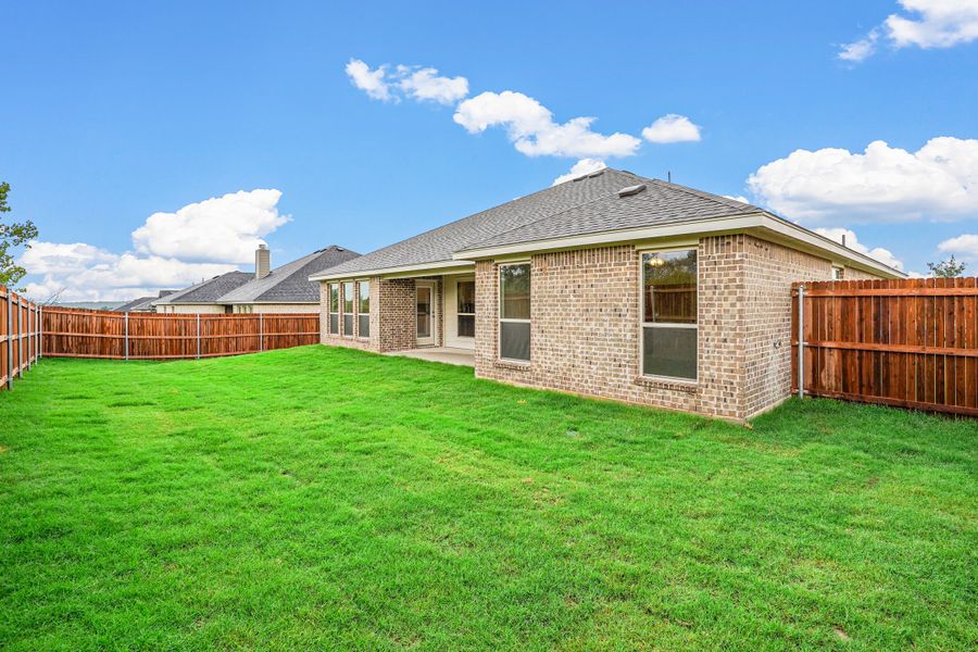 Representative exterior photo of a completed home built from the Waterford III by Cheldan Homes in Stoneview, Glen Rose, TX (Image 28).
