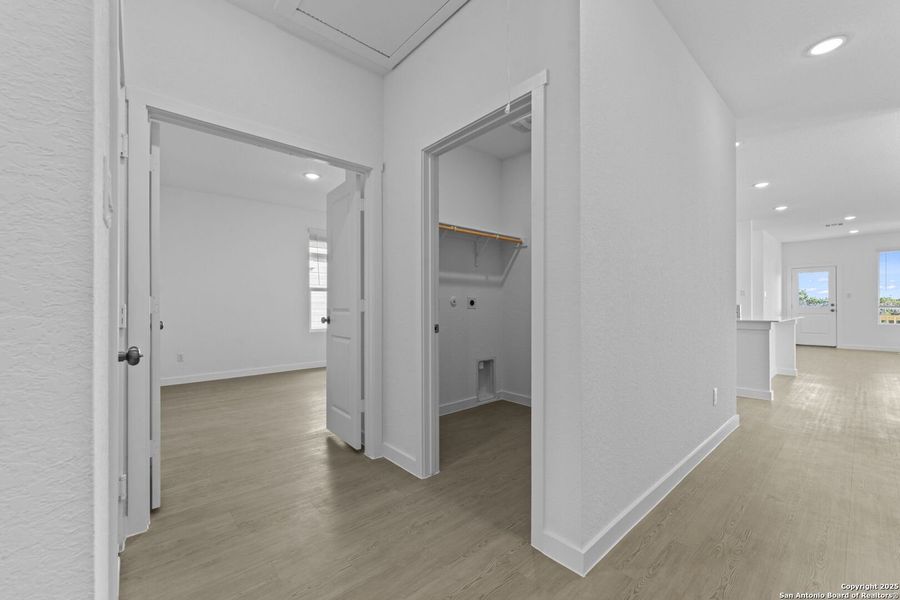 Spacious, unfurnished interior of a new home in Waterwheel: Coastline Collection, San Antonio (Image 20).