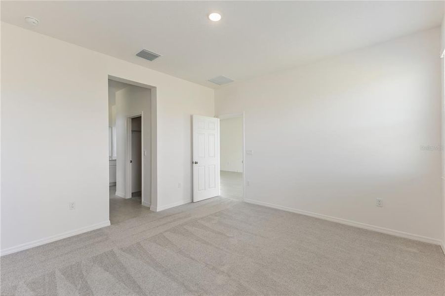 Spacious, unfurnished interior of a new home in Highfield at Twisted Oaks, Wildwood (Image 13).